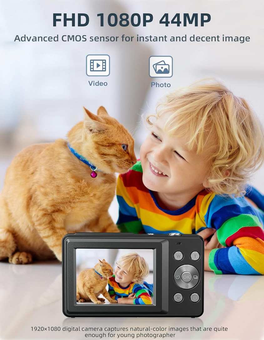 Happy child using the CAMKORY digital camera to point and shoot camera with himself and his dog.
