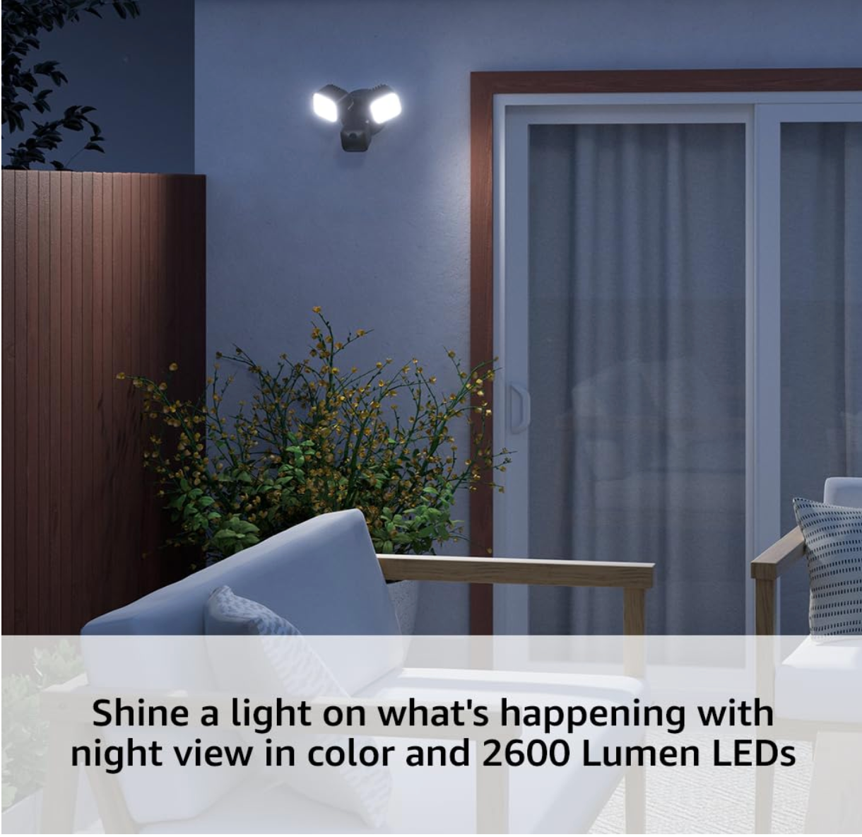 Blink Wired Floodlight Camera mounted on a wall, showing dual LED lights and built-in HD camera with 2600 lumen leds
