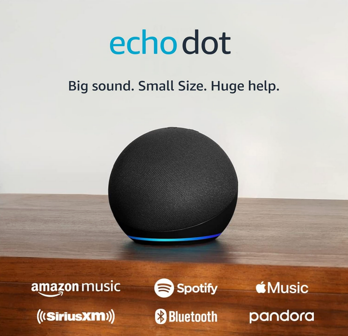 Amazon Echo Dot smart speaker in charcoal color placed on a wooden surface